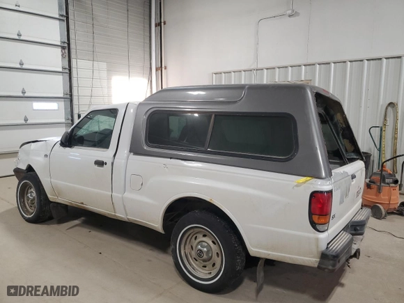 2000 Mazda B-Series 2WD Truck SX with VIN 4F4YR12CXYTM35082, listed as a Copart auction lot 82168854 with 0 mi miles and Salvage Title. Bid and sale history available at carsss.com. Image 2.