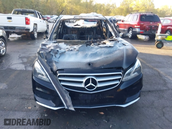 2014 Mercedes-Benz E 550 Sport with VIN WDDHF9BB0EA820235, listed as a IAAI auction lot 40606923 with Not Provided miles and . Bid and sale history available at DreamBid. Image 6.