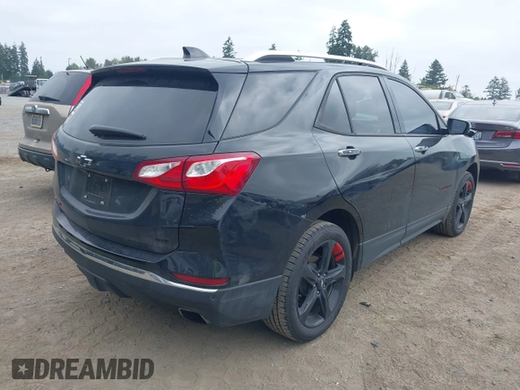 2019 Chevrolet Equinox Premier with VIN 2GNAXYEX5K6303782, listed as a IAAI auction lot 42474672 with 55,889 mi miles and . Bid and sale history available at DreamBid. Image 4.