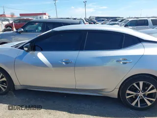 2016 Nissan Maxima Platinum with VIN 1N4AA6AP1GC400986, listed as a IAAI auction lot 41603612 with 171,784 mi miles and . Bid and sale history available at DreamBid. Image 14.