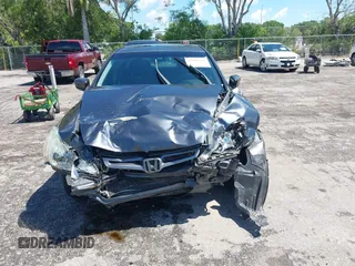 2005 Honda Accord EX z VIN 1HGCM567X5A173921, wystawiony jako IAAI lot #42261616 z przebiegiem 162 553 mil mil oraz . Historia ofert i sprzedaży dostępna na DreamBid. Obrazek 13.