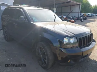 2005 Jeep Grand Cherokee Laredo with VIN 1J4GR48K65C725099, listed as a IAAI auction lot 42509223 with 249,216 mi miles and . Bid and sale history available at DreamBid. Image 1.