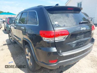2014 Jeep Grand Cherokee Limited with VIN 1C4RJEBT6EC187548, listed as a IAAI auction lot 42210601 with 138,451 mi miles and . Bid and sale history available at DreamBid. Image 3.