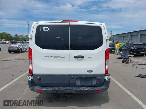 2015 Ford Transit XL with VIN 1FBZX2ZM8FKA42597, listed as a IAAI auction lot 42241346 with 195,673 mi miles and . Bid and sale history available at DreamBid. Image 17.
