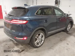 2015 Lincoln MKC with VIN 5LMTJ2AH0FUJ28744, listed as a IAAI auction lot 41888775 with 145,872 mi miles. Bid and sale history available at carsss.com. Image 4.