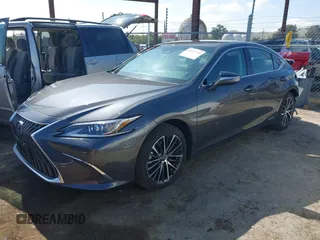 2022 Lexus ES 300h with VIN 58ADA1C15NU026266, listed as a IAAI auction lot 42121610 with 18,059 mi miles and . Bid and sale history available at DreamBid. Image 2.