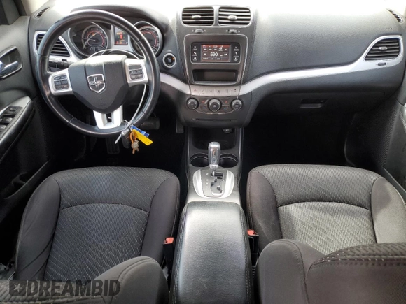 2013 Dodge Journey SXT with VIN 3C4PDCBG9DT710666, listed as a Copart auction lot 86851234 with 165,171 mi miles and Salvage title. Bid and sale history available at DreamBid. Image 8.