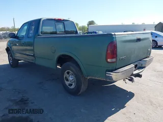 1997 Ford F-150 XL with VIN 1FTDX1861VNA45664, listed as a IAAI auction lot 42005279 with 209,847 mi miles. Bid and sale history available at carsss.com. Image 3.