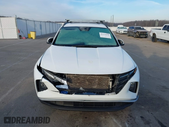2022 Hyundai Tucson SEL with VIN 5NMJCCAE7NH158933, listed as a IAAI auction lot 41531628 with 57,996 mi miles and . Bid and sale history available at DreamBid. Image 12.