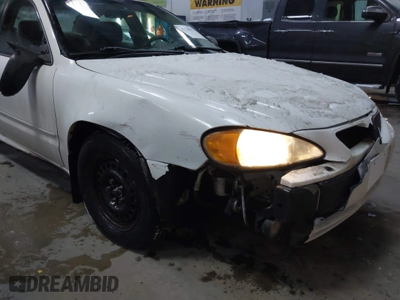 2005 Pontiac Grand Am SE with VIN 1G2NE52E75M198223, listed as a IAAI auction lot 41310937 with 100,889 mi miles. Bid and sale history available at carsss.com. Image 6.
