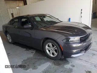 2020 Dodge Charger SXT z VIN 2C3CDXBG1LH116252, wystawiony jako Copart lot #55725565 z przebiegiem 95 039 mil mil oraz Czysty tytuł • Clean title. Historia ofert i sprzedaży dostępna na DreamBid. Obrazek 4.