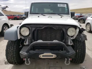 2011 Jeep Wrangler Unlimited Sport with VIN 1J4BA3H13BL637724, listed as a Copart auction lot 50417595 with 145,498 mi miles and Salvage Title. Bid and sale history available at carsss.com. Image 5.