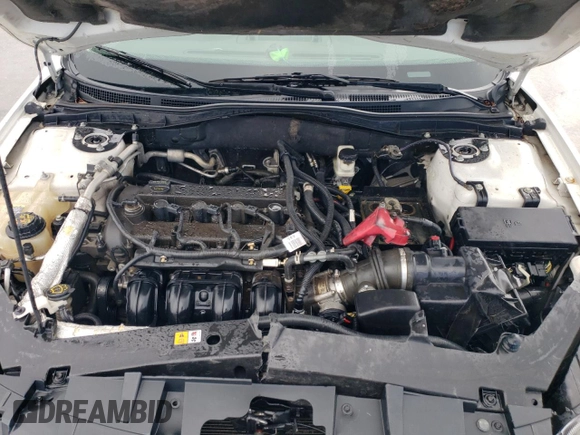 2012 Ford Fusion SE z VIN 3FAHP0HA3CR194075, wystawiony jako Copart lot #63380895 z przebiegiem 176 634 mil mil oraz Szkoda całkowita • Salvage title. Historia ofert i sprzedaży dostępna na DreamBid. Obrazek 11.