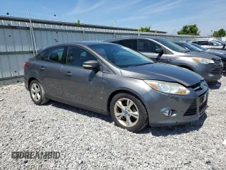 2012 Ford Focus SE z VIN 1FAHP3F23CL328787, wystawiony jako Copart lot #63186125 z przebiegiem 198 629 mil mil oraz Szkoda całkowita • Salvage title. Historia ofert i sprzedaży dostępna na DreamBid. Obrazek 4.