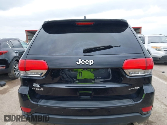 2017 Jeep Grand Cherokee Laredo with VIN 1C4RJFAG2HC649408, listed as a IAAI auction lot 42072440 with 58,818 mi miles and . Bid and sale history available at DreamBid. Image 16.
