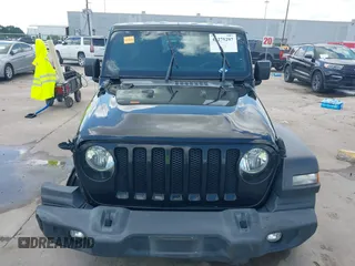 2019 Jeep Wrangler Unlimited Sport S with VIN 1C4HJXDG9KW653488, listed as a IAAI auction lot 42275297 with Not provided miles and . Bid and sale history available at DreamBid. Image 12.