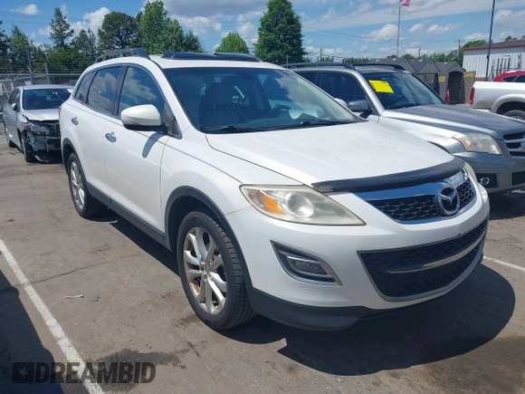 2012 Mazda CX-9 Grand Touring with VIN JM3TB2DA0C0360225, listed as a IAAI auction lot 42181667 with 195,306 mi miles and . Bid and sale history available at DreamBid. Image 1.