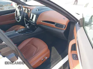 2023 Maserati Levante z VIN ZN661YUM6PX411566, wystawiony jako IAAI lot #41219590 z przebiegiem 24 613 mil mil oraz . Historia ofert i sprzedaży dostępna na DreamBid. Obrazek 5.