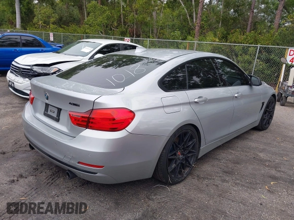 2015 BMW 4 Series 435i with VIN WBA4B1C58FG241018, listed as a IAAI auction lot 41401671 with 79,369 mi miles. Bid and sale history available at carsss.com. Image 4.