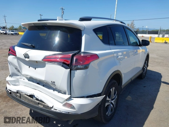 2017 Toyota RAV4 LE with VIN JTMBFREV9HJ147391, listed as a IAAI auction lot 41993617 with 90,666 mi miles. Bid and sale history available at carsss.com. Image 4.