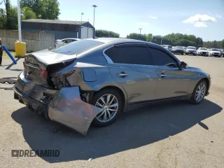2015 Infiniti Q50 Premium z VIN JN1BV7ARXFM391291, wystawiony jako Copart lot #61765885 z przebiegiem 129 617 mil mil oraz Szkoda całkowita • Salvage title. Historia ofert i sprzedaży dostępna na DreamBid. Obrazek 3.