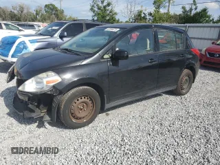 2009 Nissan Versa 1.8 S with VIN 3N1BC13EX9L498529, listed as a Copart auction lot 52096575 with 119,697 mi miles and Salvage Title. Bid and sale history available at carsss.com. Image 1.