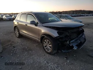 2013 Volkswagen Touareg Lux with VIN WVGEF9BP9DD008935, listed as a Copart auction lot 79859394 with Not Provided miles and Salvage Title. Bid and sale history available at DreamBid. Image 4.