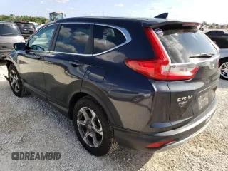 2018 Honda CR-V EX with VIN 7FARW1H57JE029448, listed as a Copart auction lot 70052882 with 57,388 mi miles. Bid and sale history available at carsss.com. Image 2.