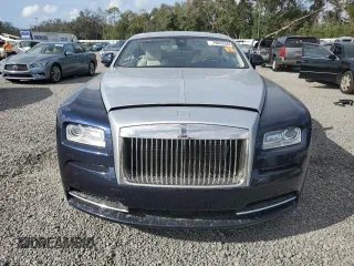 2014 Rolls-Royce Wraith z VIN SCA665C55EUX84597, wystawiony jako Copart lot #79843344 z przebiegiem Nie podano mil oraz Szkody całkowita. Historia ofert i sprzedaży dostępna na DreamBid. Obrazek 5.
