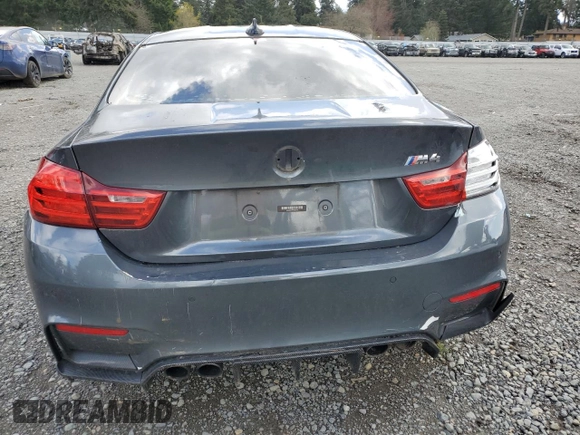 2015 BMW M4 with VIN WBS3R9C56FK330181, listed as a Copart auction lot 51498315 with Not provided miles and Salvage title. Bid and sale history available at DreamBid. Image 6.