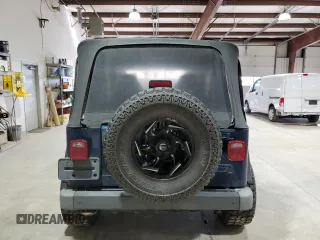 2002 Jeep Wrangler Sport with VIN 1J4FA49S82P703420, listed as a Copart auction lot 53322175 with 87,642 mi miles and Salvage Title. Bid and sale history available at carsss.com. Image 6.
