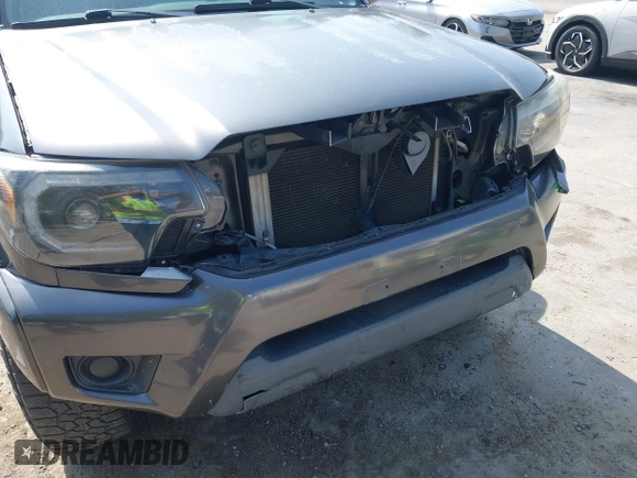 2013 Toyota Tacoma PreRunner z VIN 5TFJX4GN2DX018800, wystawiony jako IAAI lot #42304447 z przebiegiem 188 409 mil mil oraz . Historia ofert i sprzedaży dostępna na DreamBid. Obrazek 19.