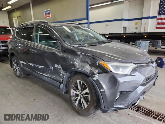 2016 Toyota RAV4 XLE with VIN 2T3RFREV6GW451194, listed as a Copart auction lot 59293325 with 168,739 mi miles and Salvage title. Bid and sale history available at DreamBid. Image 4.