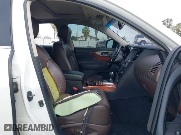 2012 Infiniti FX with VIN JN8AS1MUXCM122268, listed as a IAAI auction lot 41696622 with 158,335 mi miles and . Bid and sale history available at DreamBid. Image 5.