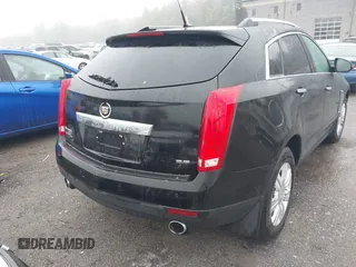 2014 Cadillac SRX Luxury Collection z VIN 3GYFNEE32ES643679, wystawiony jako IAAI lot #42172274 z przebiegiem 122 276 mil mil oraz . Historia ofert i sprzedaży dostępna na DreamBid. Obrazek 17.