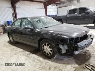1999 Buick Regal GS with VIN 2G4WF5219X1424704, listed as a Copart auction lot 42899215 with 137,744 mi miles and Salvage Title. Bid and sale history available at carsss.com. Image 4.