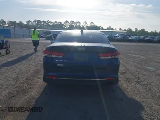 2017 Kia Optima LX with VIN 5XXGT4L35HG174613, listed as a IAAI auction lot 42097790 with 243,335 mi miles. Bid and sale history available at carsss.com. Image 16.