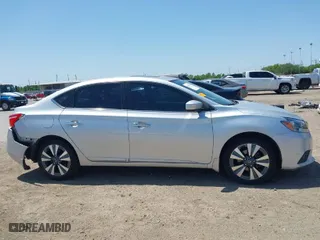 2019 Nissan Sentra S with VIN 3N1AB7AP2KY203809, listed as a IAAI auction lot 42026306 with 73,424 mi miles. Bid and sale history available at carsss.com. Image 13.