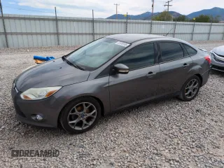2013 Ford Focus SE with VIN 1FADP3F24DL189897, listed as a Copart auction lot 61970155 with 212,218 mi miles and Salvage title. Bid and sale history available at DreamBid. Image 1.