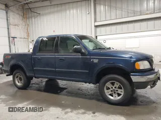 2003 Ford F-150 XLT z VIN 1FTRW08L73KC11631, wystawiony jako IAAI lot #42673130 z przebiegiem 188 945 mil mil oraz . Historia ofert i sprzedaży dostępna na DreamBid. Obrazek 13.