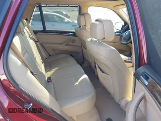 2011 BMW X5 35i with VIN 5UXZV4C52BL413125, listed as a IAAI auction lot 41697824 with 136,828 mi miles. Bid and sale history available at carsss.com. Image 8.