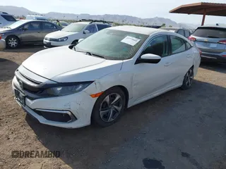 2019 Honda Civic Sedan LX with VIN 2HGFC2F62KH573149, listed as a IAAI auction lot 41575660 with 104,139 mi miles. Bid and sale history available at carsss.com. Image 17.