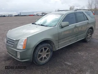 2004 Cadillac SRX with VIN 1GYDE63A340128713, listed as a IAAI auction lot 41788552 with 158,606 mi miles. Bid and sale history available at carsss.com. Image 2.