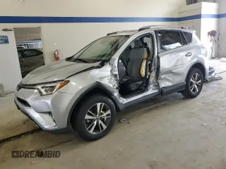 2018 Toyota RAV4 XLE with VIN JTMWFREV1JJ207459, listed as a Copart auction lot 65210125 with 46,454 mi miles and Salvage title. Bid and sale history available at DreamBid. Image 1.
