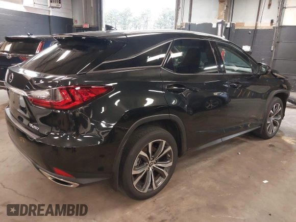 2021 Lexus RX with VIN 2T2HZMDA2MC279445, listed as a IAAI auction lot 41913178 with 38,598 mi miles. Bid and sale history available at carsss.com. Image 4.