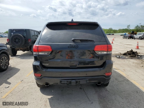 2015 Jeep Grand Cherokee Laredo with VIN 1C4RJFAG5FC724874, listed as a Copart auction lot 52462214 with 99,650 mi miles and Salvage Title. Bid and sale history available at carsss.com. Image 6.