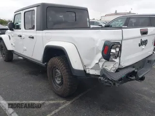 2022 Jeep Gladiator Willys with VIN 1C6HJTAG1NL148524, listed as a IAAI auction lot 41507693 with 42,004 mi miles and . Bid and sale history available at DreamBid. Image 3.