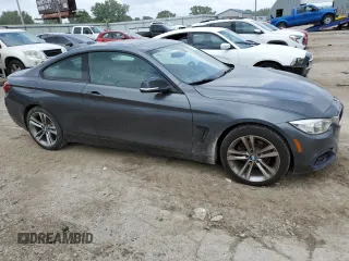 2014 BMW 4 Series 428i xDrive with VIN WBA3N5C51EF717379, listed as a Copart auction lot 59744615 with 112,800 mi miles and Clean title. Bid and sale history available at DreamBid. Image 4.