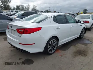2015 Kia Optima SX with VIN 5XXGR4A70FG490244, listed as a IAAI auction lot 42076958 with 140,820 mi miles and . Bid and sale history available at DreamBid. Image 4.
