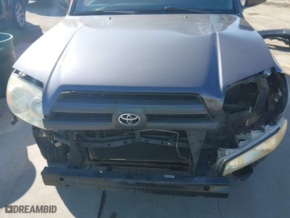 2003 Toyota 4Runner SR5 with VIN JTEZU14R238001341, listed as a IAAI auction lot 41670928 with 212,723 mi miles. Bid and sale history available at carsss.com. Image 6.